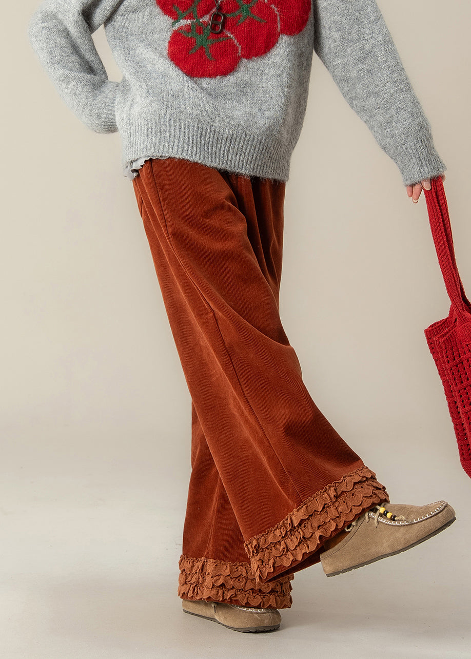 Pantalones rectos de pana oversize con volantes en rojo ladrillo de moda para primavera