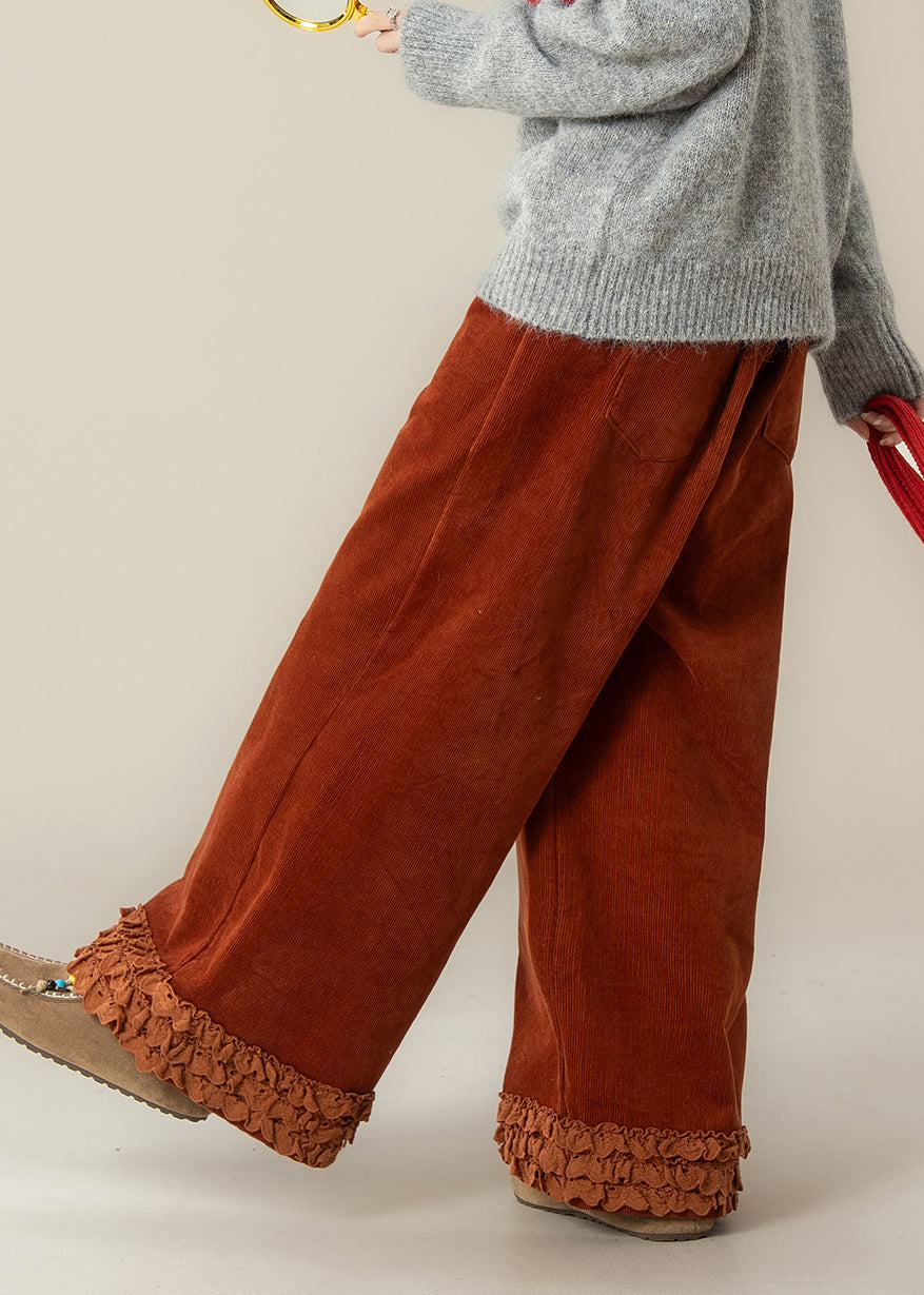 Pantalones rectos de pana oversize con volantes en rojo ladrillo de moda para primavera