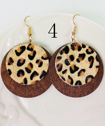 Pendientes circulares con adornos de piel de vaca auténtica de moda con diseño en capas.