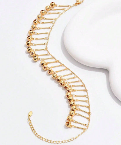 Modische Fußkettchen aus Goldlegierung mit Glockenmuster, Quasten und Aushöhlung