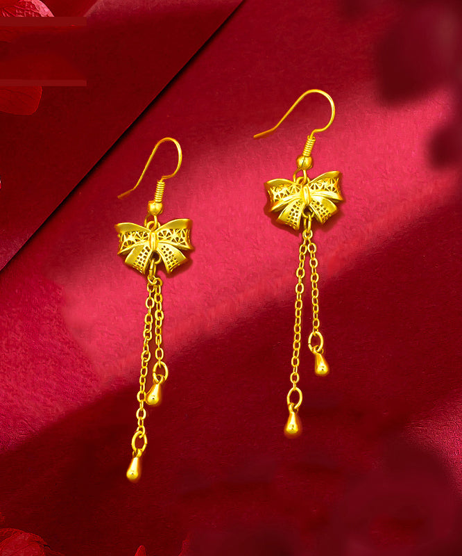 Pendientes colgantes con borlas y lazo de plata de ley dorada a la moda