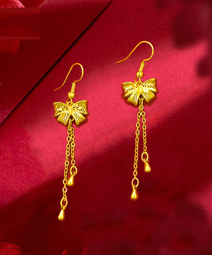 Pendientes colgantes con borlas y lazo de plata de ley dorada a la moda