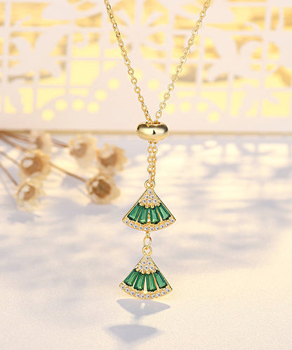 Collar con colgante de abanico de circonitas doradas y cobre verde a la moda