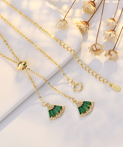 Collar con colgante de abanico de circonitas doradas y cobre verde a la moda