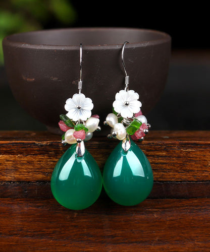 Pendientes colgantes de plata verde con incrustaciones de concha, flor de calcedonia y perla.