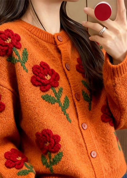 Cárdigan holgado de punto con estampado floral y cuello redondo de color naranja a la moda para primavera.