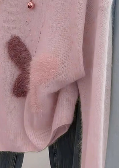 Suéter corto de punto con mariposas de gran tamaño en color rosa de moda para primavera