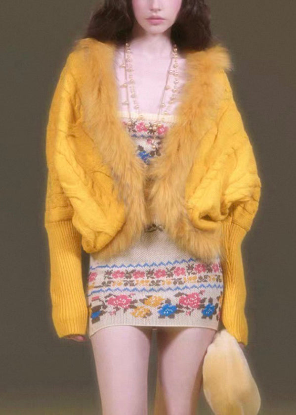 Cárdigan de punto de algodón con cuello de piel morado y patchwork con mangas farol