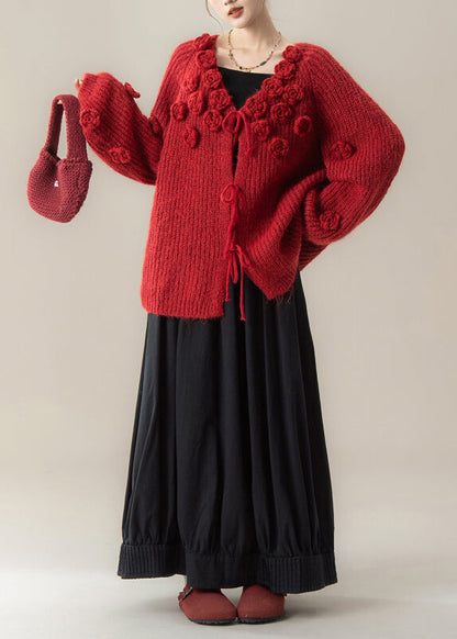 Modisches zweiteiliges Set aus rotem Strickpullover und Rock mit V-Ausschnitt und Blumenmuster für den Winter