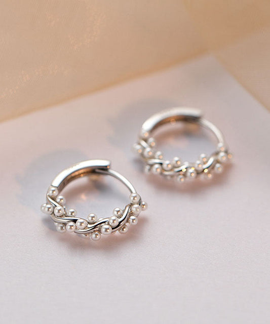 Pendientes de perlas de plata de ley con diseño de seda de moda