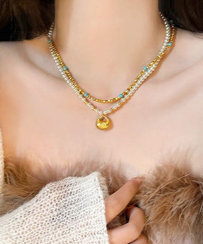 Collar con colgante de dos piezas de plata de ley dorada con turquesa y perla