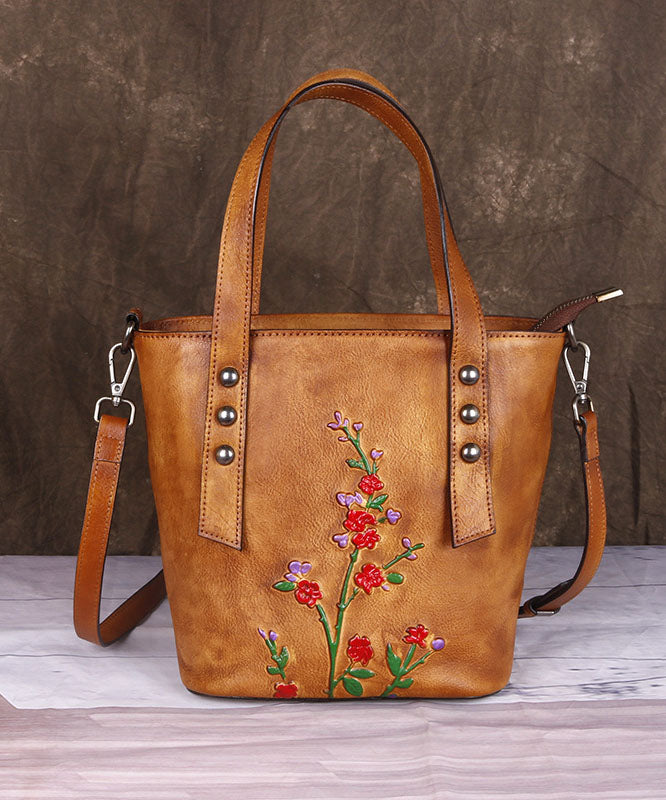 Modische Umhängetasche aus Kalbsleder in Gelb mit Prägung