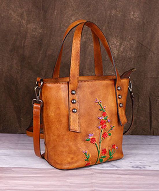 Modische Umhängetasche aus Kalbsleder in Gelb mit Prägung