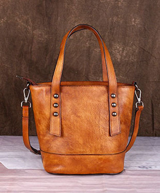 Modische Umhängetasche aus Kalbsleder in Gelb mit Prägung