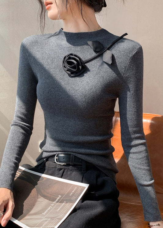 Modische gelbe, figurbetonte Stricktops mit Blumenmuster für den Frühling