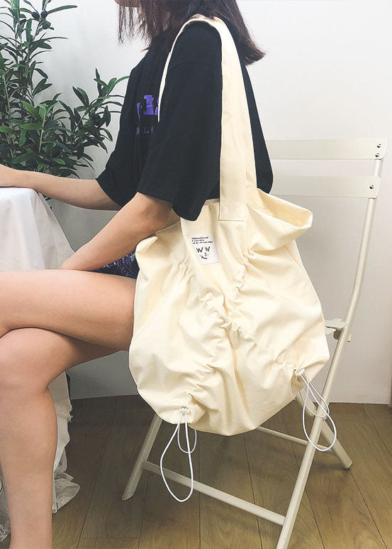 Feine beigefarbene Satchel-Handtasche aus massiver Baumwolle