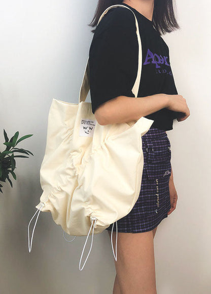 Feine beigefarbene Satchel-Handtasche aus massiver Baumwolle