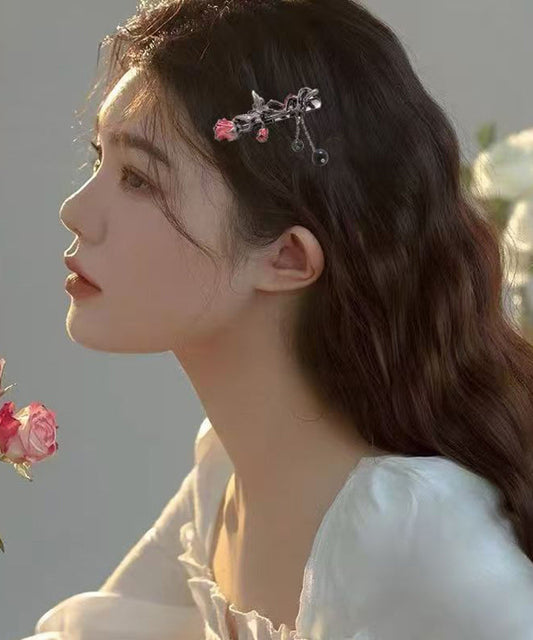 Horquilla con borla de mariposa y rosa de aleación negra fina