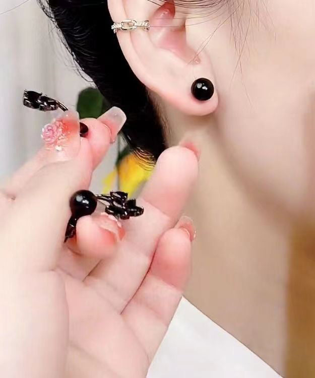 Pendientes florales con gemas incrustadas de aleación negra fina