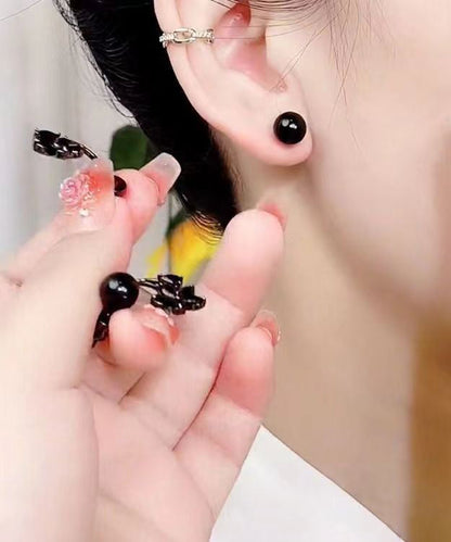 Pendientes florales con gemas incrustadas de aleación negra fina