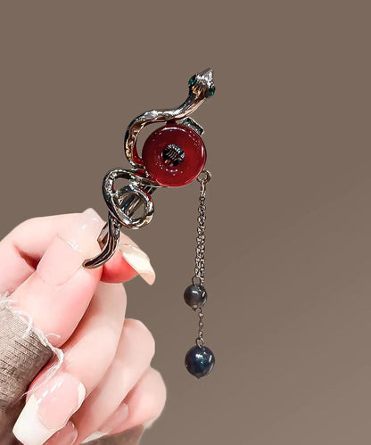 Feine schwarze Legierung Serpentinen-Ping-Schnalle mit Quaste, Haarnadel