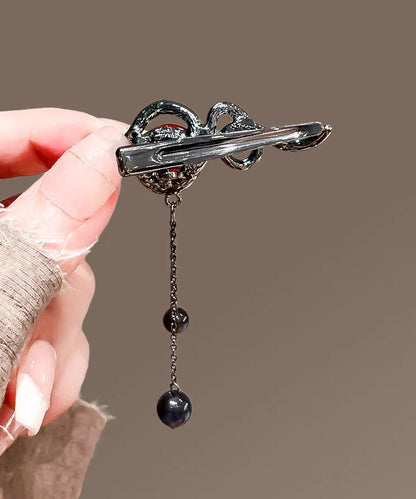 Feine schwarze Legierung Serpentinen-Ping-Schnalle mit Quaste, Haarnadel