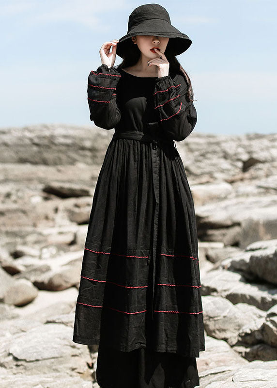 Feines schwarzes, tailliertes Patchwork-Baumwollkleid Frühling