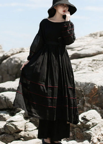 Feines schwarzes, tailliertes Patchwork-Baumwollkleid Frühling