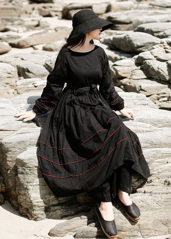 Feines schwarzes, tailliertes Patchwork-Baumwollkleid Frühling