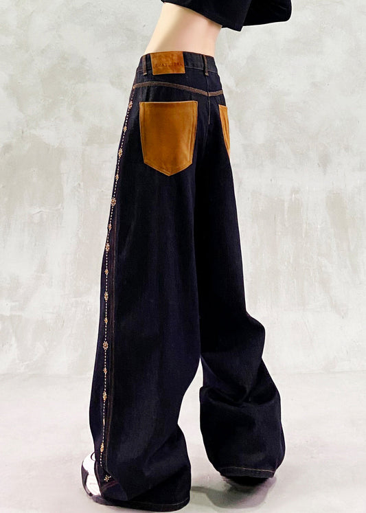 Feine schwarze bestickte Patchwork-Jeanshose für den Frühling