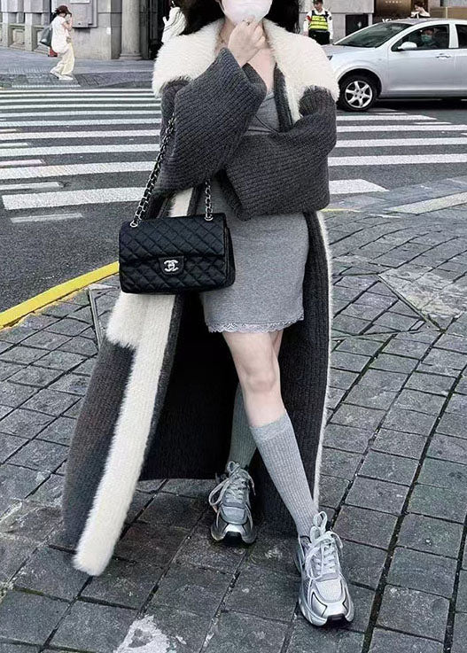 Feiner schwarzer langer Strickcardigan mit Peter-Pan-Kragen, Taschen und Patchwork-Muster aus Nerzhaar für den Winter