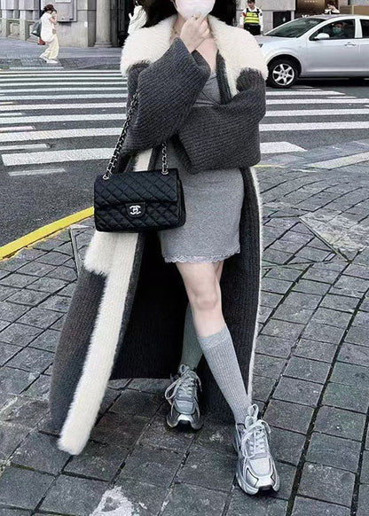 Feiner schwarzer langer Strickcardigan mit Peter-Pan-Kragen, Taschen und Patchwork-Muster aus Nerzhaar für den Winter