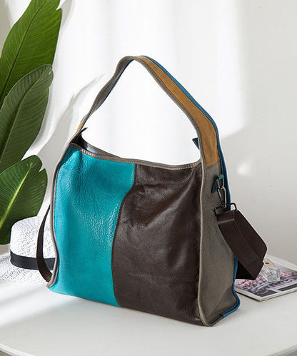 Feine blaue Umhängetasche aus Kalbsleder mit Patchwork-Muster