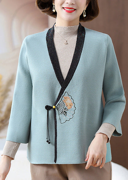 Feine blaue Strickjacken mit V-Ausschnitt und Print für den Frühling