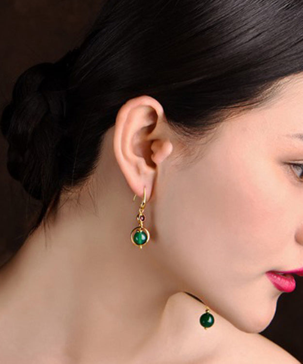 Pendientes asimétricos de libélula con ágata y granate en oro fino de 14 quilates