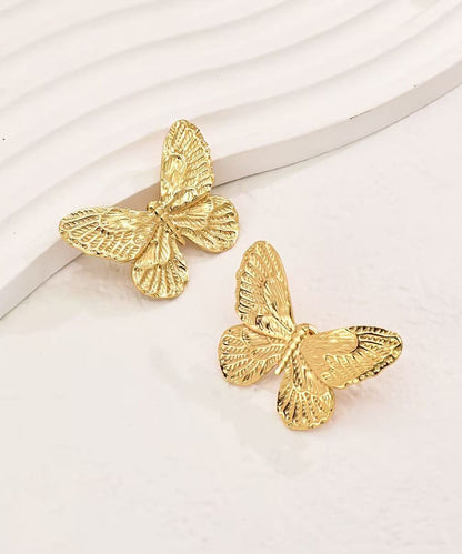 Pendientes de mariposa de aleación de cobre y oro fino