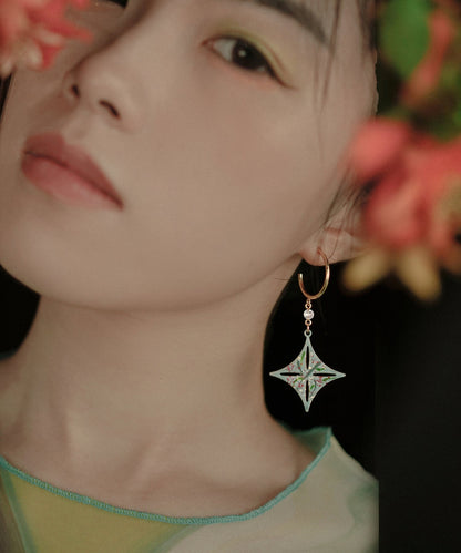 Ohrhänger aus feinem Gold und Kupfer mit Diamanten