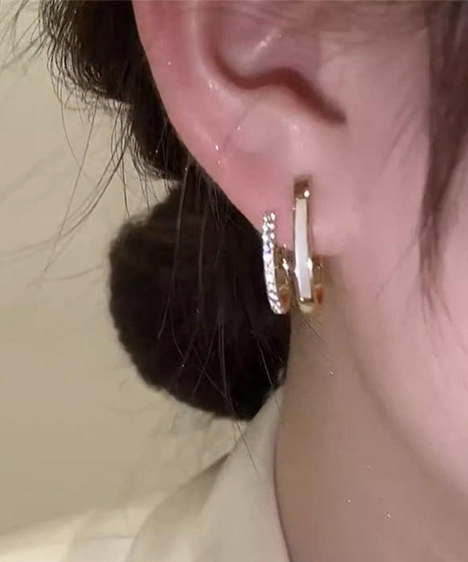 Pendientes de aro con circón y gotas de aceite de cobre dorado fino