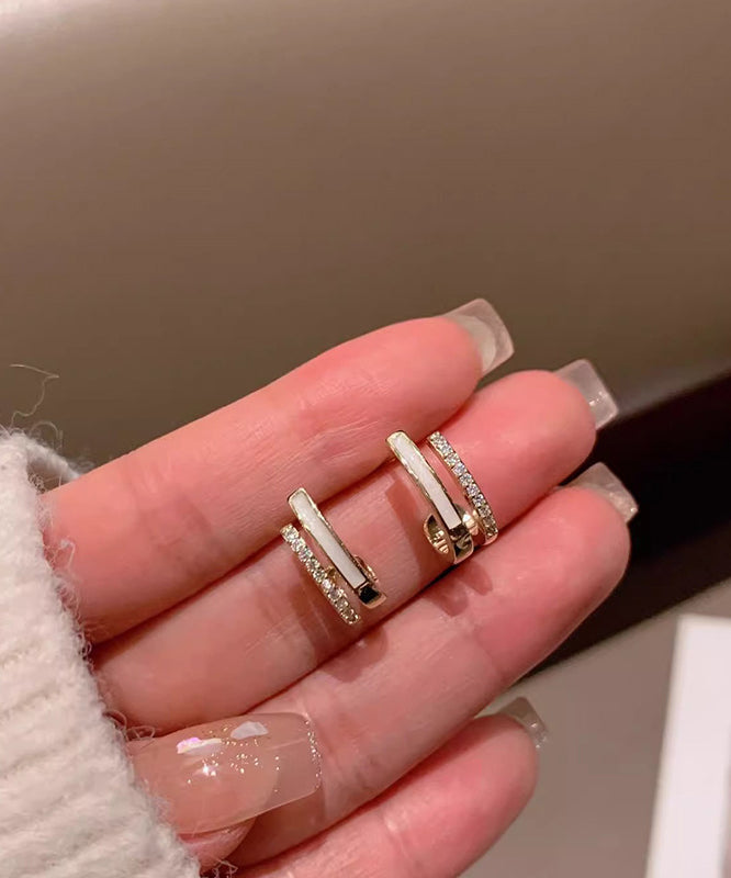 Pendientes de aro con circón y gotas de aceite de cobre dorado fino