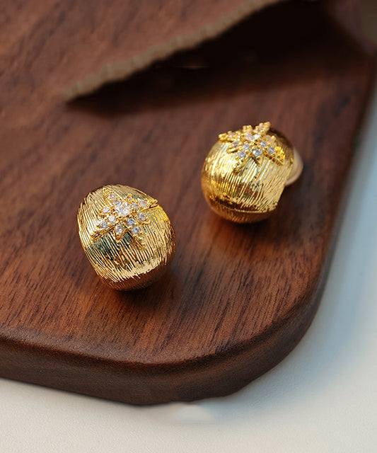 Pendientes de botón con hexagrama de circonitas y cobre dorado fino