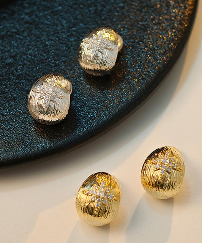 Pendientes de botón con hexagrama de circonitas y cobre dorado fino