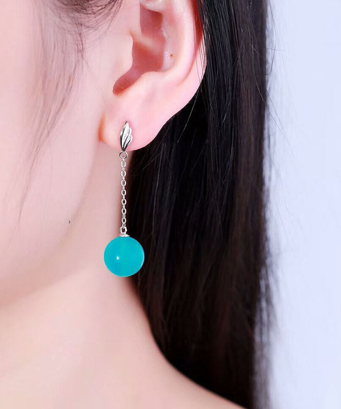 Pendientes colgantes de plata de ley y oro fino con gema azul