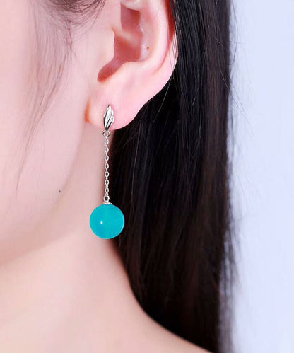 Pendientes colgantes de plata de ley y oro fino con gema azul