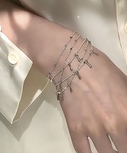 Feingoldenes, vergoldetes Quastenkettenarmband aus Sterlingsilber