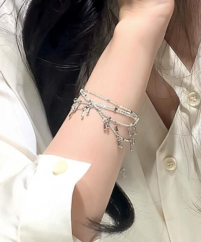 Feingoldenes, vergoldetes Quastenkettenarmband aus Sterlingsilber