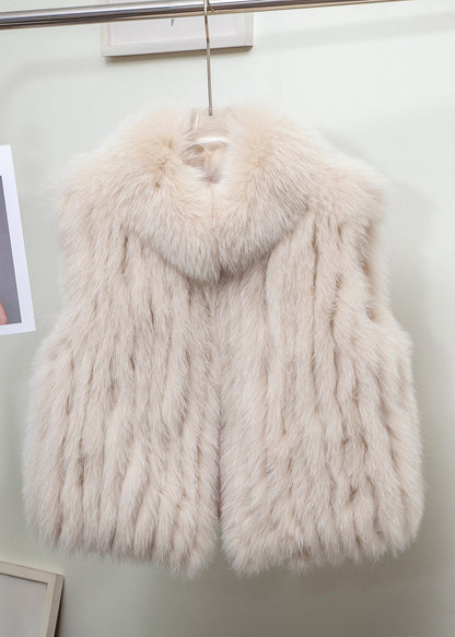 Feine hellblaue Weste mit Stehkragen aus massivem Leder und Pelz, ärmellos