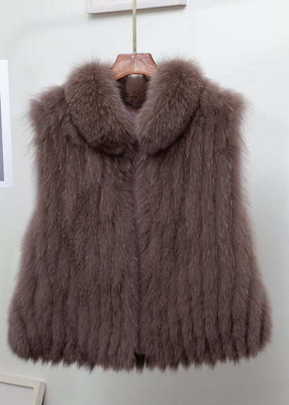 Feine hellblaue Weste mit Stehkragen aus massivem Leder und Pelz, ärmellos