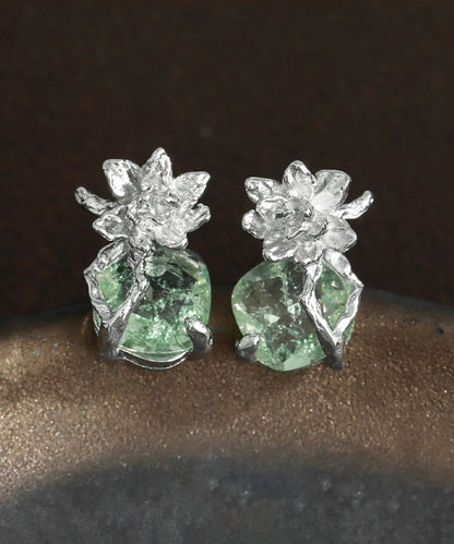 Pendientes de plata de ley con circonitas y flor de hielo de color verde claro