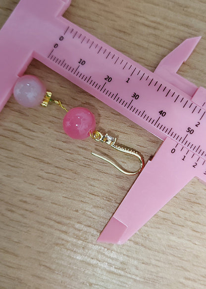 Pendientes colgantes de circonitas con bolas de acrílico rosa