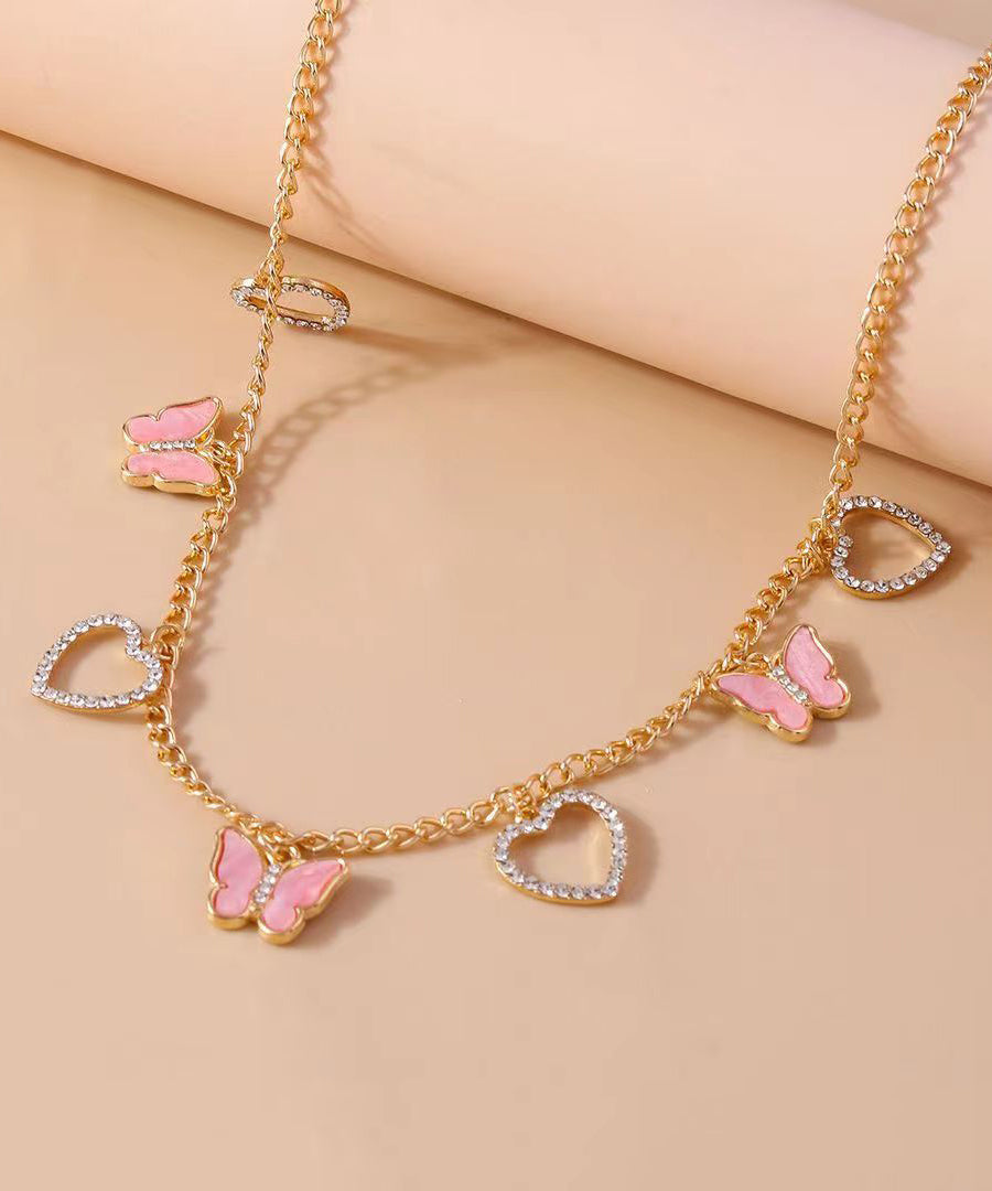 Feine Halskette mit Schmetterlingsanhänger aus Sterlingsilber mit Zirkonia-Überzug in Lila